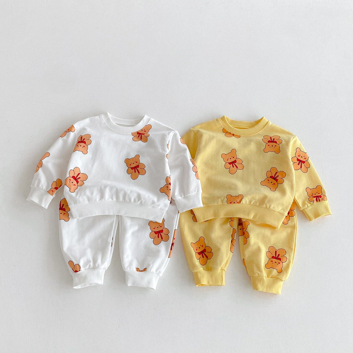 クマプリント長袖スウェット&ロングパンツの2点セット(白・イエロー)