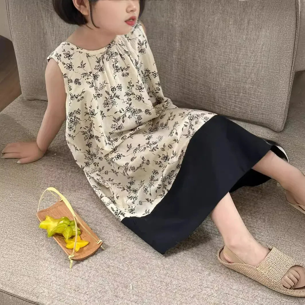キッズ用ノースリーブワンピース 花柄プリント 上身と黒い切替の裾