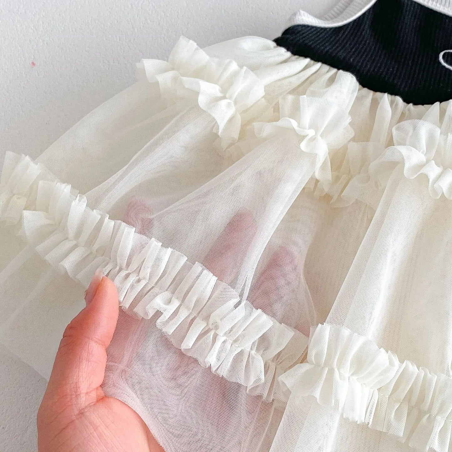 ノースリーブロンパース ベビーロンパース キャミソールボディスーツ ドッキングフリルスカート ハートアクセント