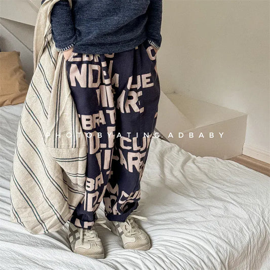 ロングパンツ・スウェットパンツ キッズパンツ ルーズロングワイドパンツ ブロックレターロゴプリント 2カラー