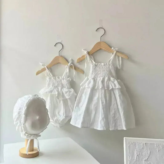 ノースリーブロンパース ベビーロンパース キャミソールペプラムフリルボディスーツ 2カラー