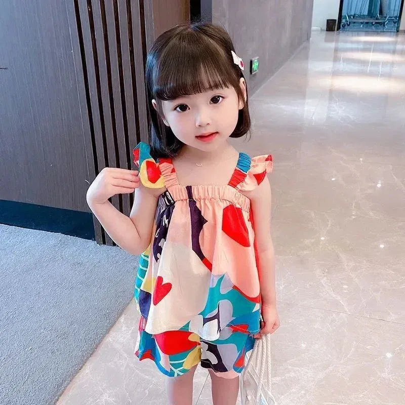 幾何学プリントのノースリーブチュニックとショートパンツのキッズセット