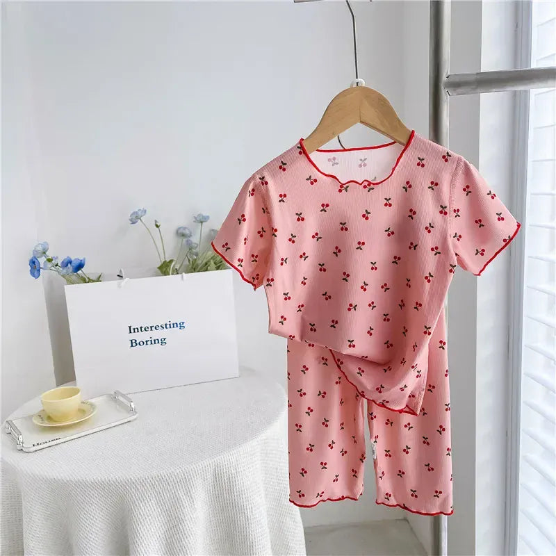 キッズパジャマセット(薄手半袖Tシャツ+パンツ)ピンク地の小さなリボン柄