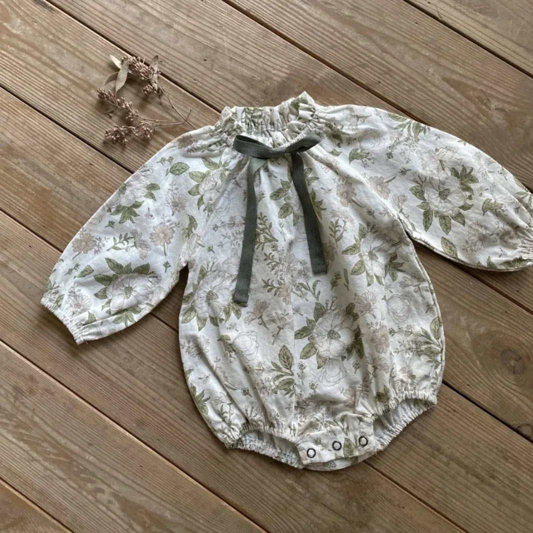 長袖ロンパース flower / 6M 66cm / 取り寄せ(7〜21日) ベビーロンパース 長袖スタンドフリルカラーボディスーツ リボン リーフボタニカルプリント/無地