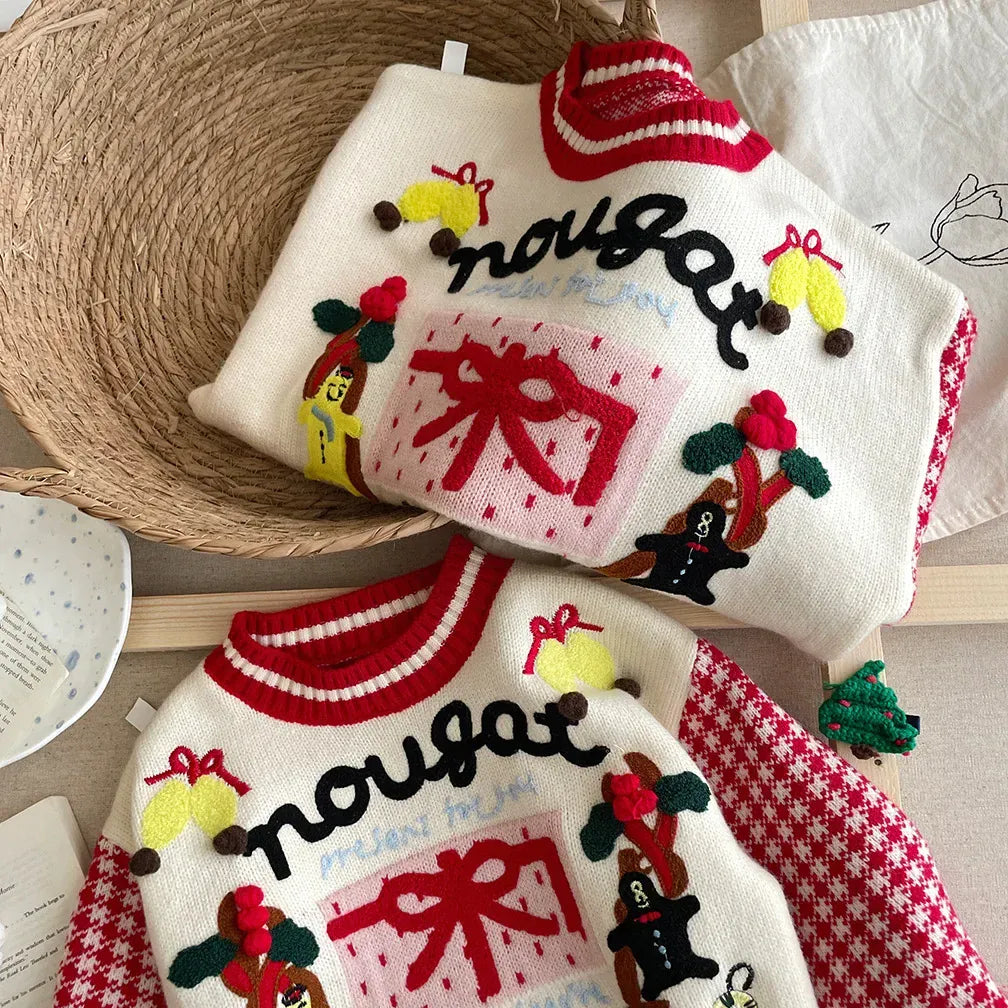 キッズ用ニットセーター 白地、赤リブのラウンドネックにクリスマス刺繍デザイン