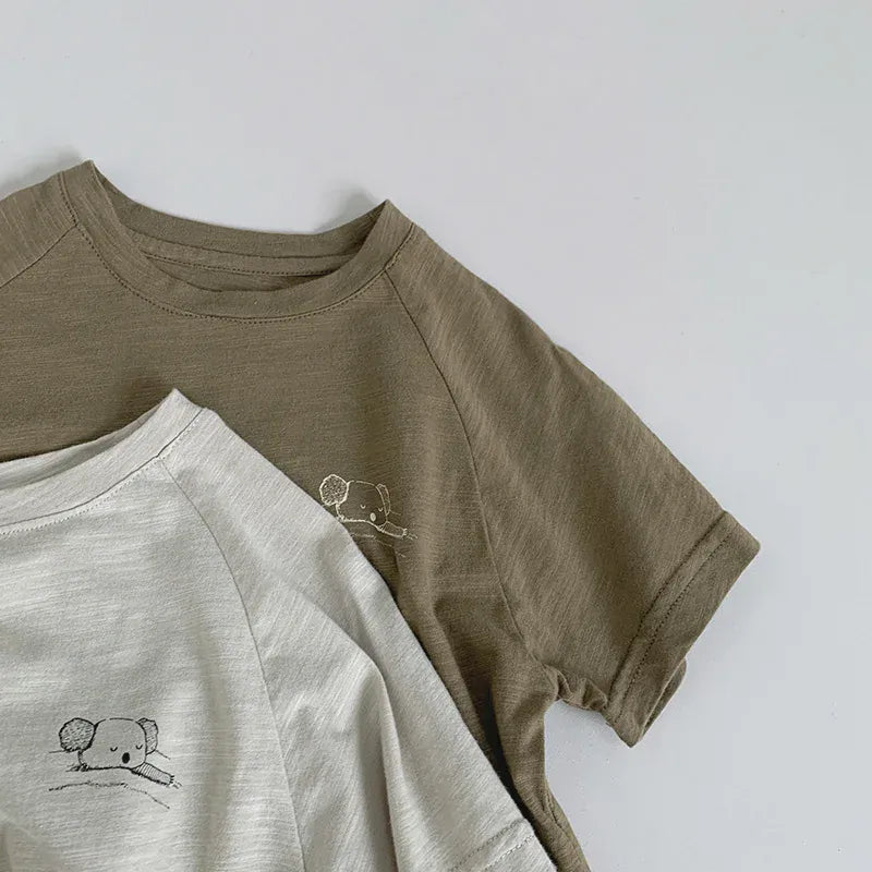 半袖Tシャツ キッズトップス 半袖Tシャツ ワンポイントプリント ラグランスリーブ シンプルベーシック 2カラー