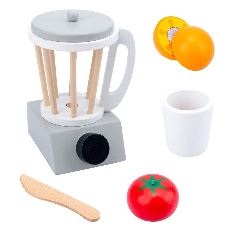 木製コーヒーミル風おままごと、木製スプーン、赤いミニトマトと白いカップ
