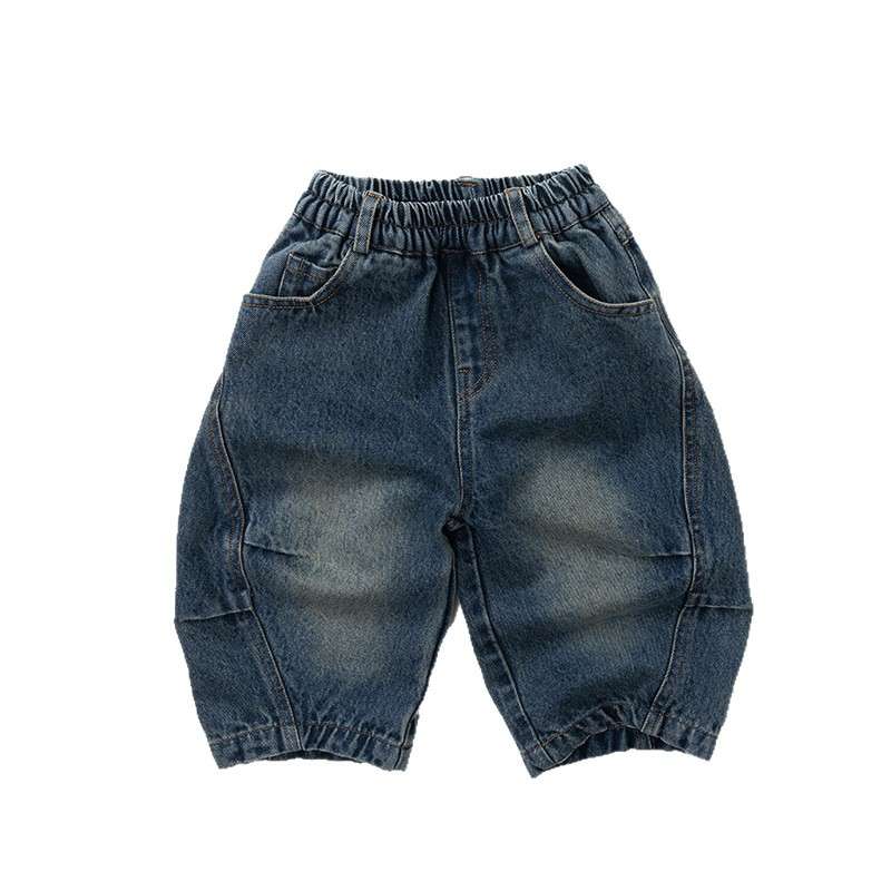 ダークブルーのデニムパンツ、前面、伸縮ウエストと縦ステッチ、ゆったりシルエット
