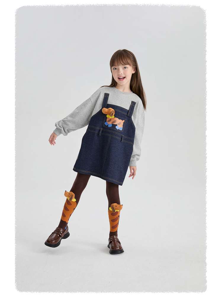 子ども用レギンス(キャラメルブラウン)、パピー柄プリントが目立つ
