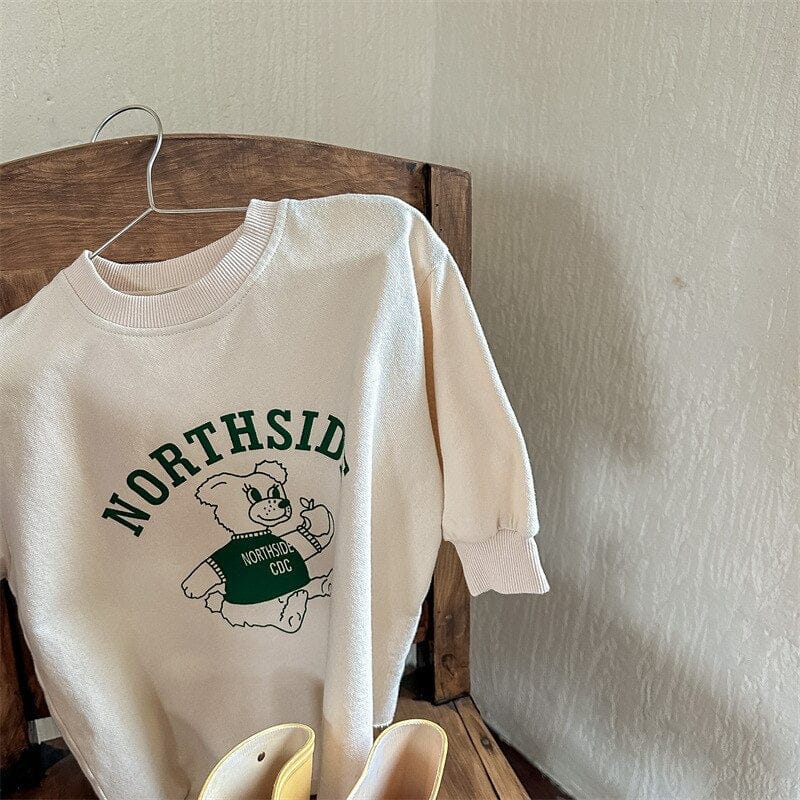 ベージュの長袖スウェットT、くまベアとNORTHSIDEロゴプリント