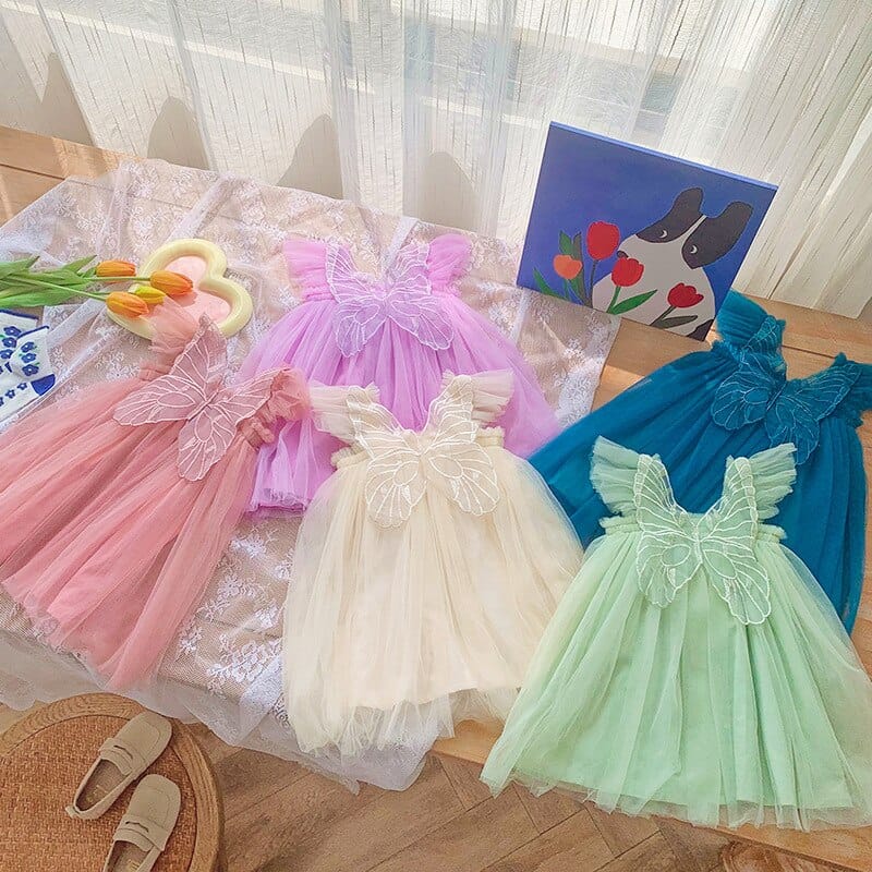キッズ用チュチュチュールのノースリーブドレス、淡いピンク系のフリルスカート