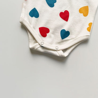 -【国内発送・送料無料】ベビーロンパース 長袖ボディスーツ カラフルハートプリント 66サイズ - mamahalo shop - 長袖ロンパース -  べビー服 - 子供服 - 男の子 - 女の子