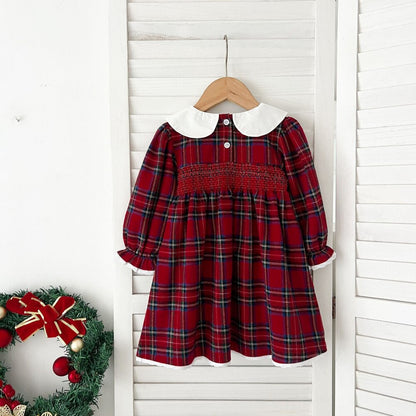 赤×黒チェックのベビー用ワンピース、前開きボタンと白丸襟のデザイン