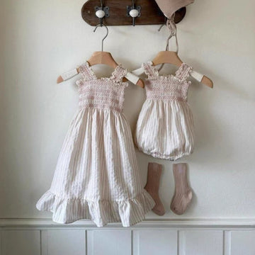 Smocked Ruffle Hem Dress ノースリーブワンピース【mh0013208】