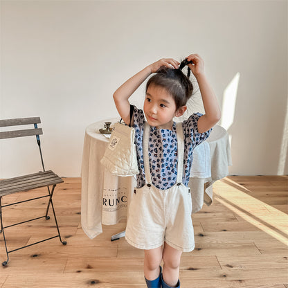 子ども用花柄ブラウス（半袖）、オフホワイト地に小花、フリル風の袖口