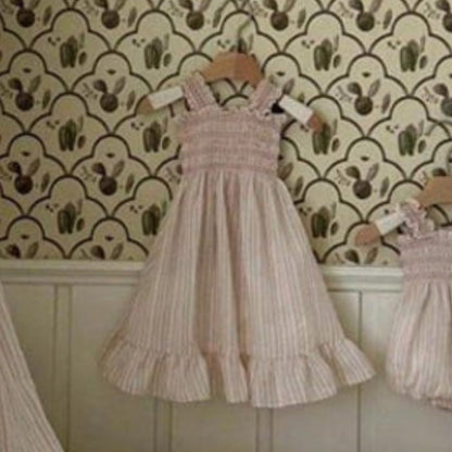 Smocked Ruffle Hem Dress ノースリーブワンピース【mh0013208】
