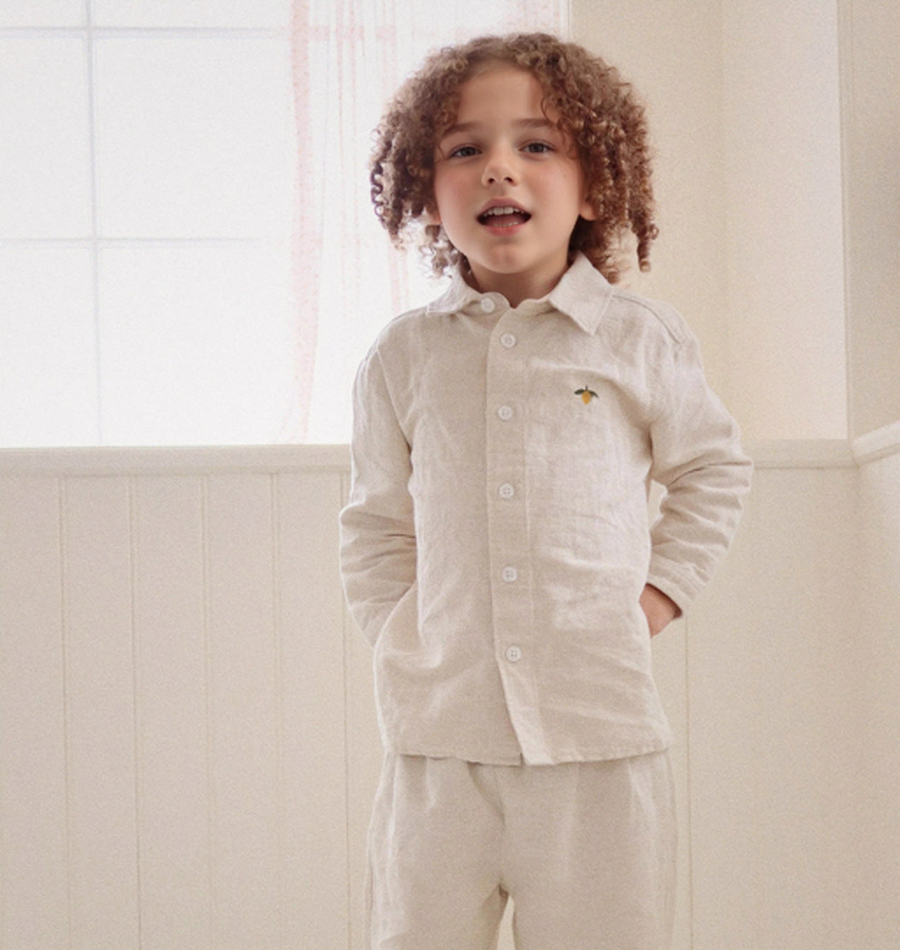 Simple long-sleeved shirt in subtle colors with lemon embroidery. Kids' top. [mh0011561]