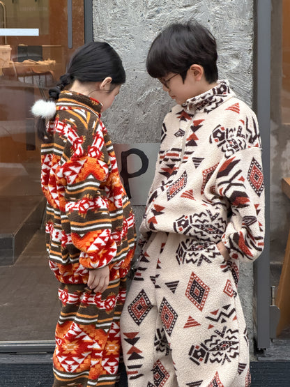 Two-piece flannel set featuring a tribal and geometric print, full zip-up, stand-up collar, and fleece. [mh0011860]