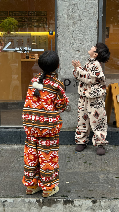 Two-piece flannel set featuring a tribal and geometric print, full zip-up, stand-up collar, and fleece. [mh0011860]