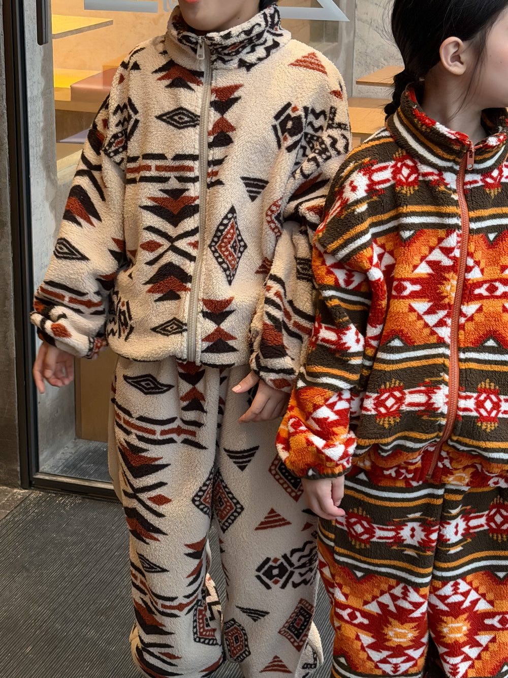 Two-piece flannel set featuring a tribal and geometric print, full zip-up, stand-up collar, and fleece. [mh0011860]