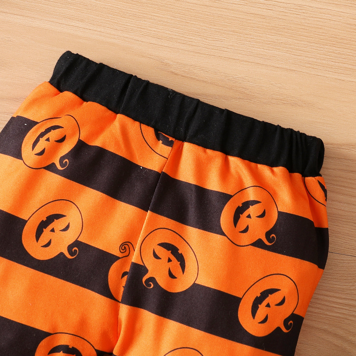 オレンジ×黒のハロウィン柄ロングパンツ、ウエストゴムアップ
