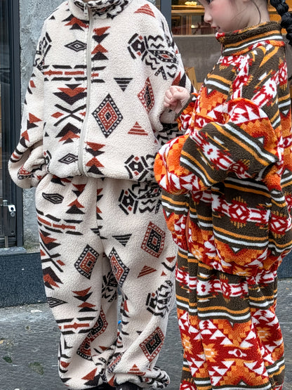 Two-piece flannel set featuring a tribal and geometric print, full zip-up, stand-up collar, and fleece. [mh0011860]
