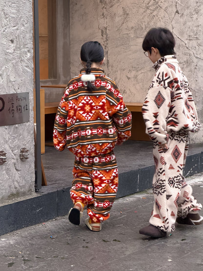 Two-piece flannel set featuring a tribal and geometric print, full zip-up, stand-up collar, and fleece. [mh0011860]
