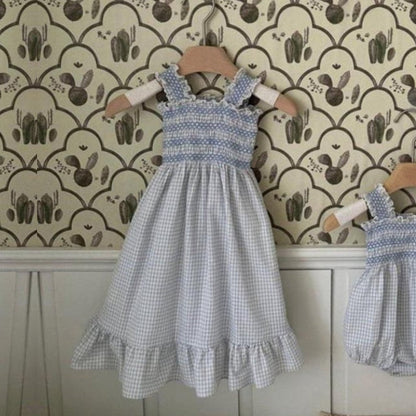 Smocked Ruffle Hem Dress ノースリーブワンピース【mh0013208】