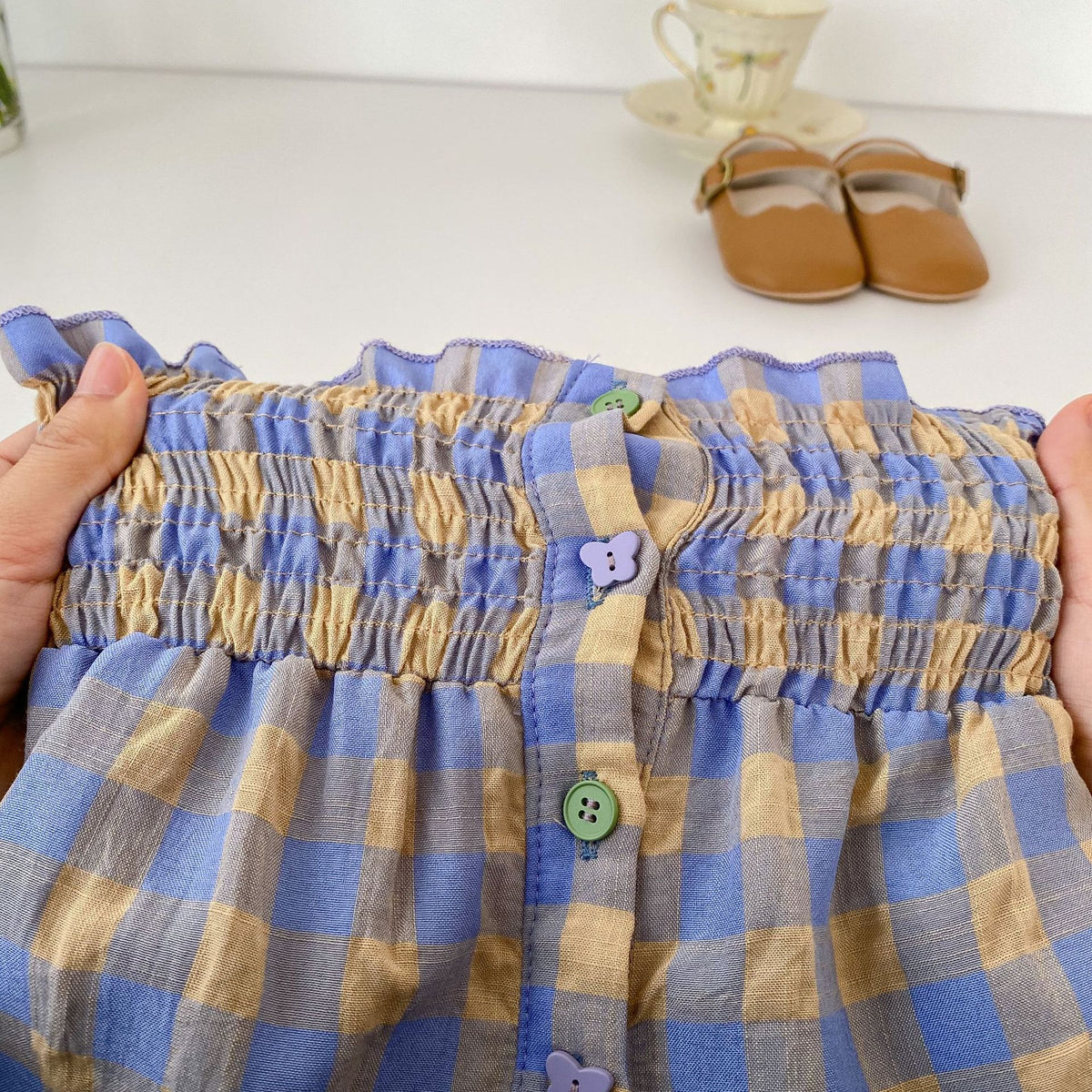 Conjunto de camisola fruncida con volantes y shorts a cuadros para bebé