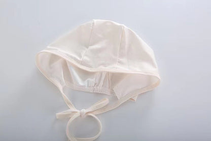 キッズ用布帽子（ベージュ系）、つば広めでリボンひも付き