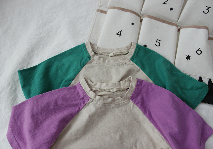 Camiseta infantil bicolor de manga corta raglán