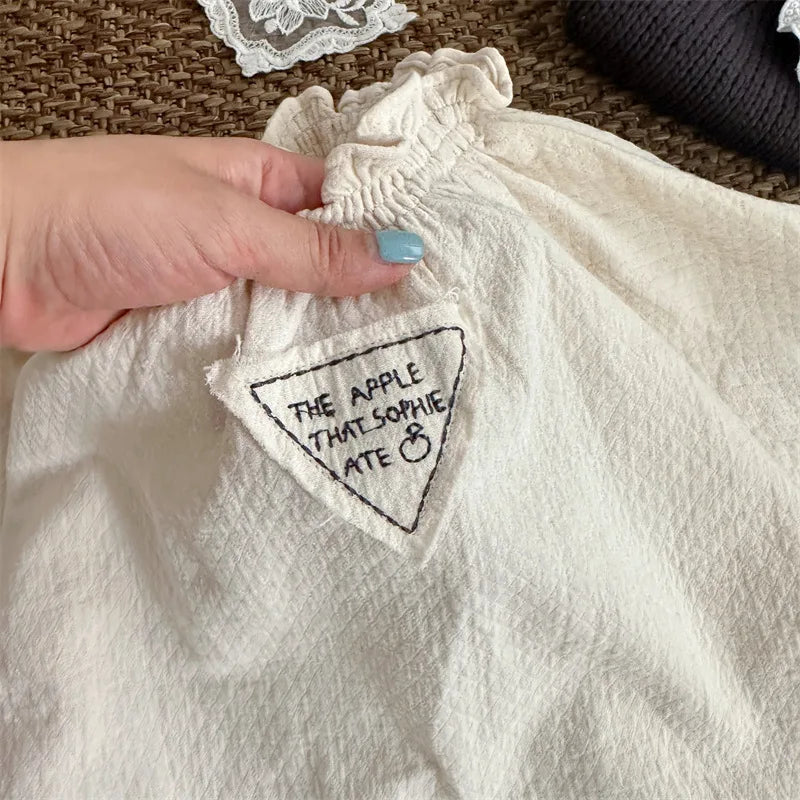 -キッズワンピース ワンポイント三角タグフリルカラー長袖スモッグワンピース ベージュ - mamahalo shop - 長袖ワンピース -  べビー服 - 子供服 - 男の子 - 女の子