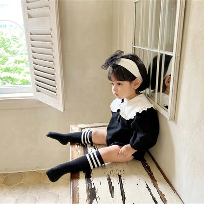 -ベビーロンパース フリルビッグ襟 長袖ボディスーツ ブラック/チェック【mh0004224】 - mamahalo shop - 長袖ロンパース -  べビー服 - 子供服 - 男の子 - 女の子