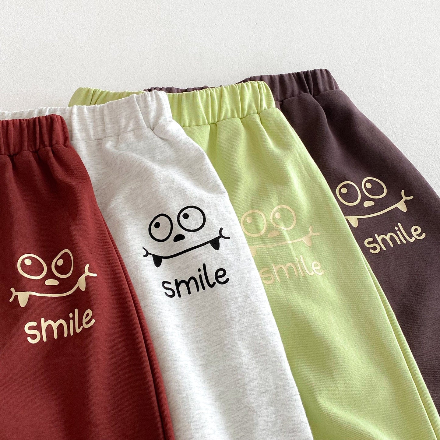 長袖セットアップ スマイルフェイスプリント長袖スウェットシャツ+ロングスウェットパンツセットアップ 2点セット【mh0010676】