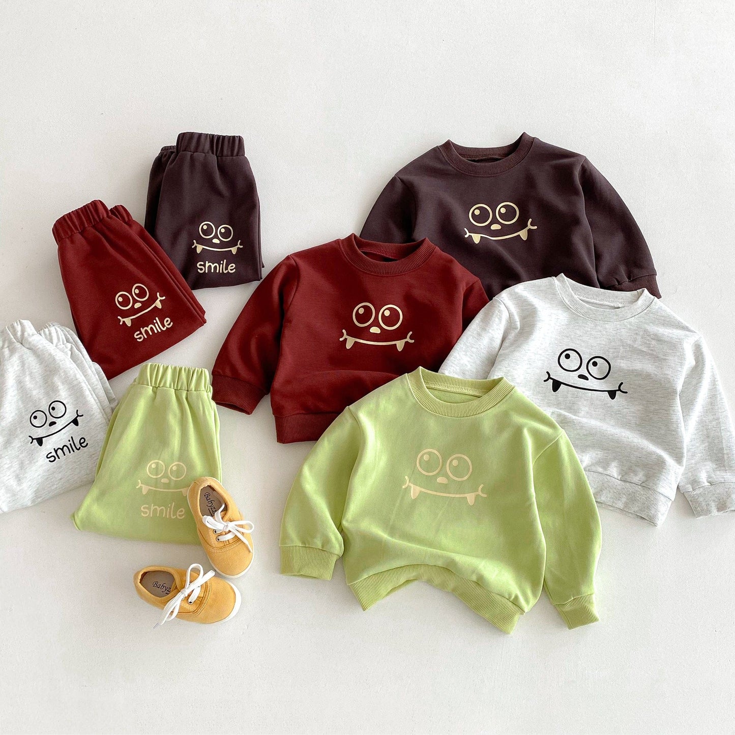 長袖セットアップ スマイルフェイスプリント長袖スウェットシャツ+ロングスウェットパンツセットアップ 2点セット【mh0010676】