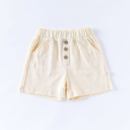 アイボリーのコットンショートパンツ、前ボタンとウエストゴム