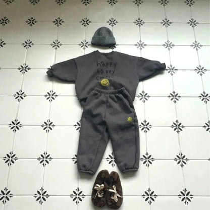 長袖セットアップ レタリングスマイルロゴプリントスウェットトレーナー+パンツセットアップ 2点セット【mh0011110】