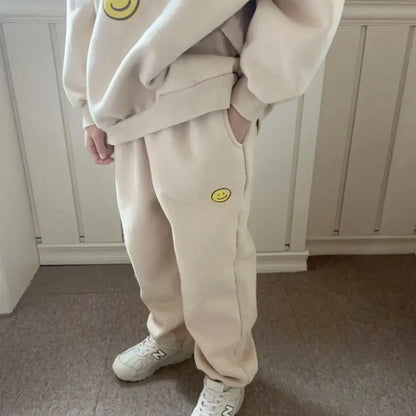 長袖セットアップ レタリングスマイルロゴプリントスウェットトレーナー+パンツセットアップ 2点セット【mh0011110】