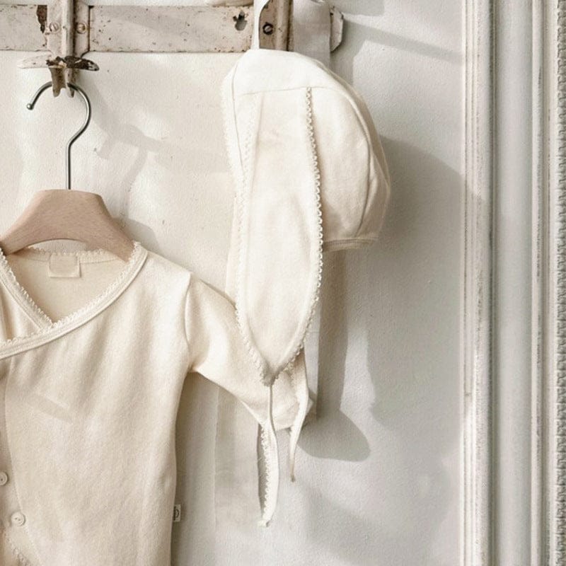 長袖ロンパース Light Apricot Hat / One Size フロントリボンロンパース 足つきデザイン コットン新生児カバーオール【mh0010893】