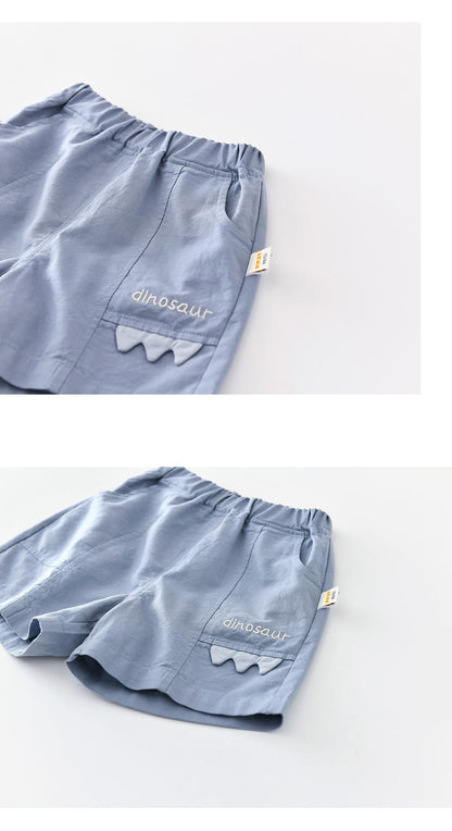 恐竜刺繍入りベビーショートパンツ（ブルー）、横向き