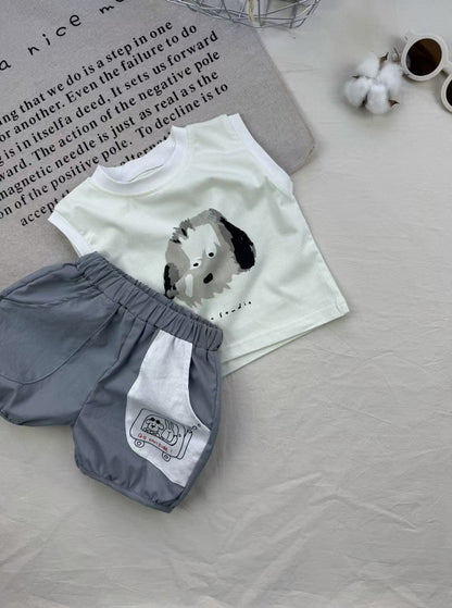 白タンクトップとグレーショートパンツ、犬のカートゥーンプリント