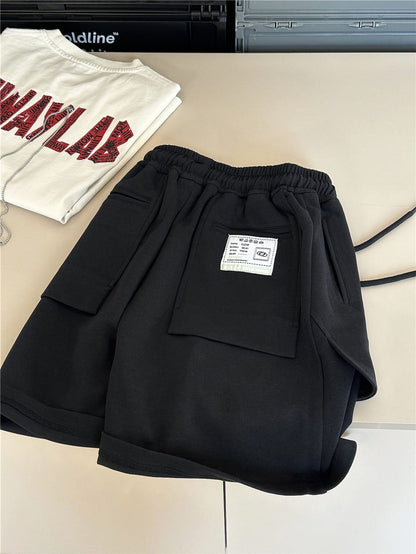 スウェットハーフパンツ（ブラック）フロントのパッチポケット、ドローストリングとゴム