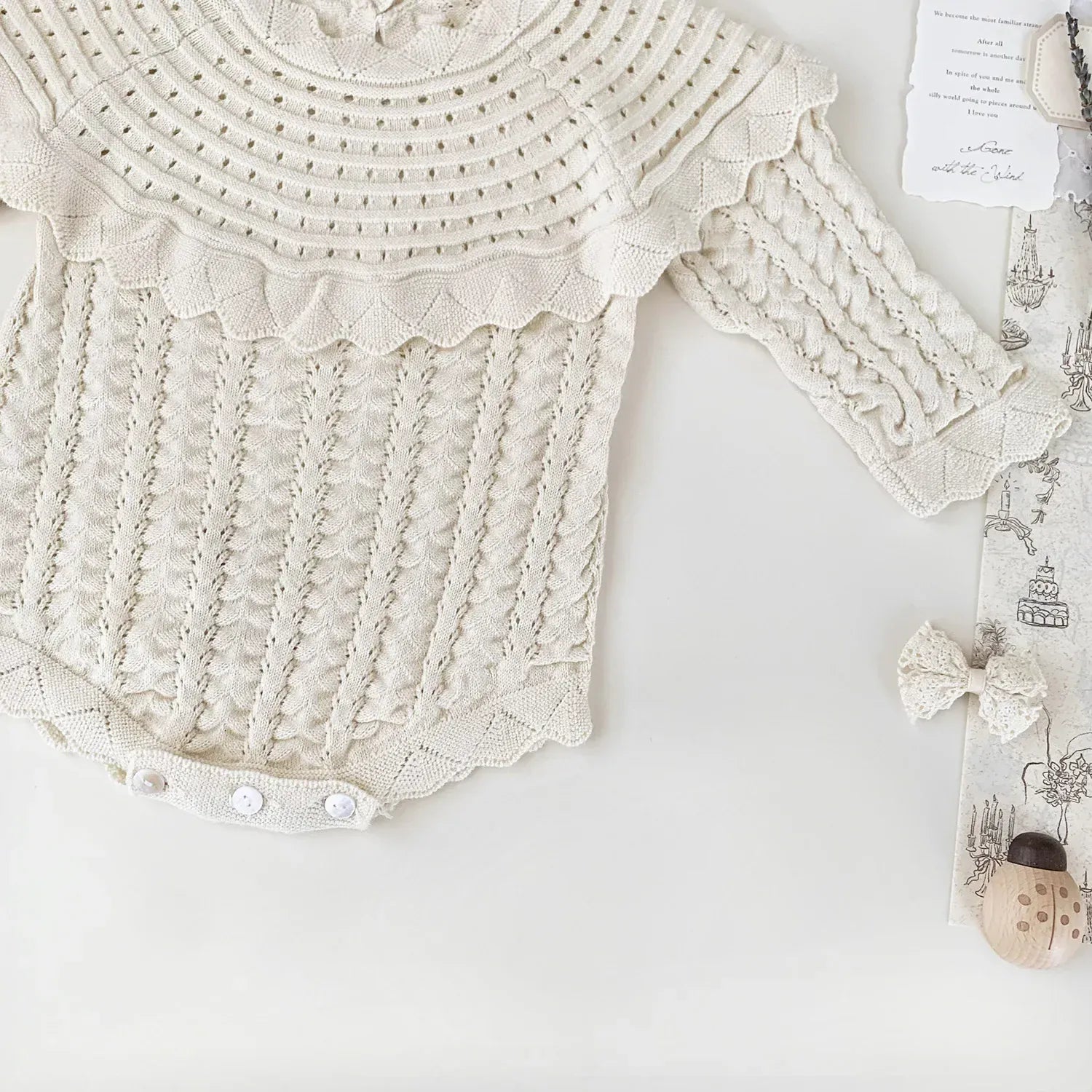 長袖ロンパース ベビーロンパース フリルショールレースニット長袖ボディスーツ