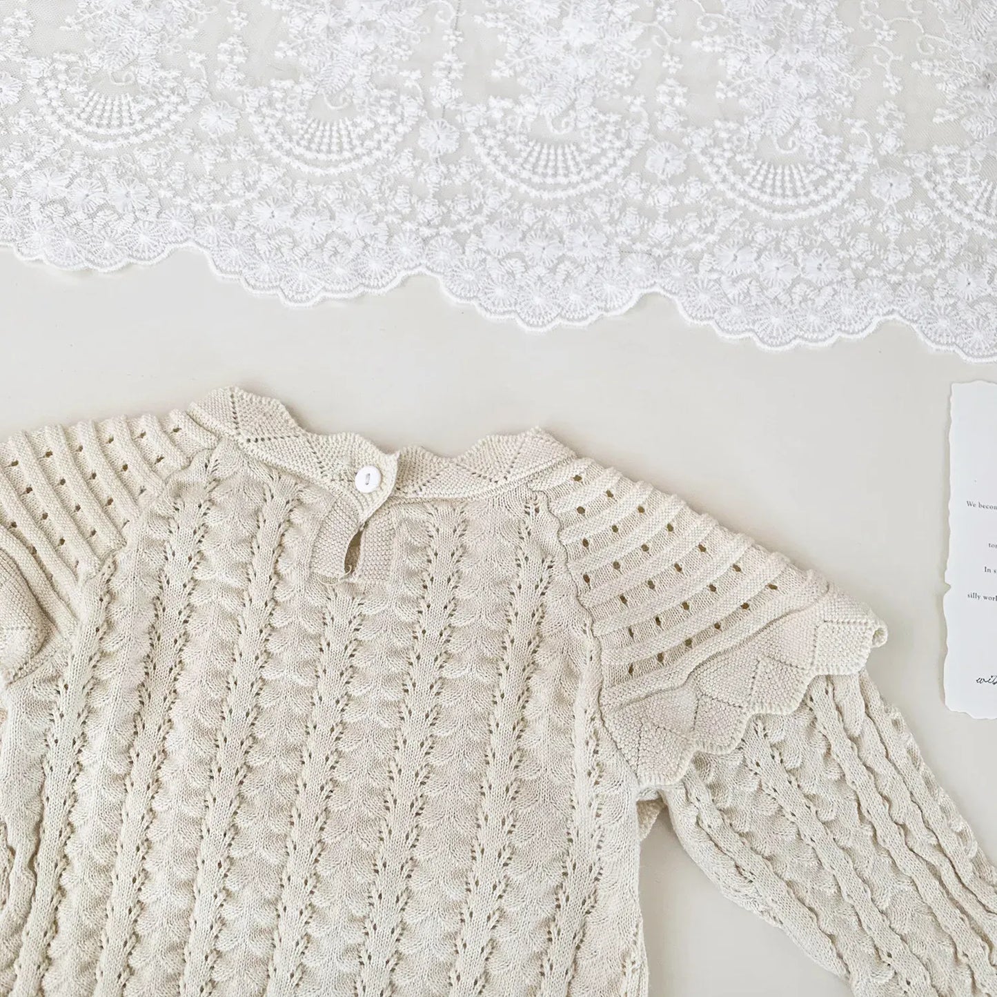 長袖ロンパース ベビーロンパース フリルショールレースニット長袖ボディスーツ