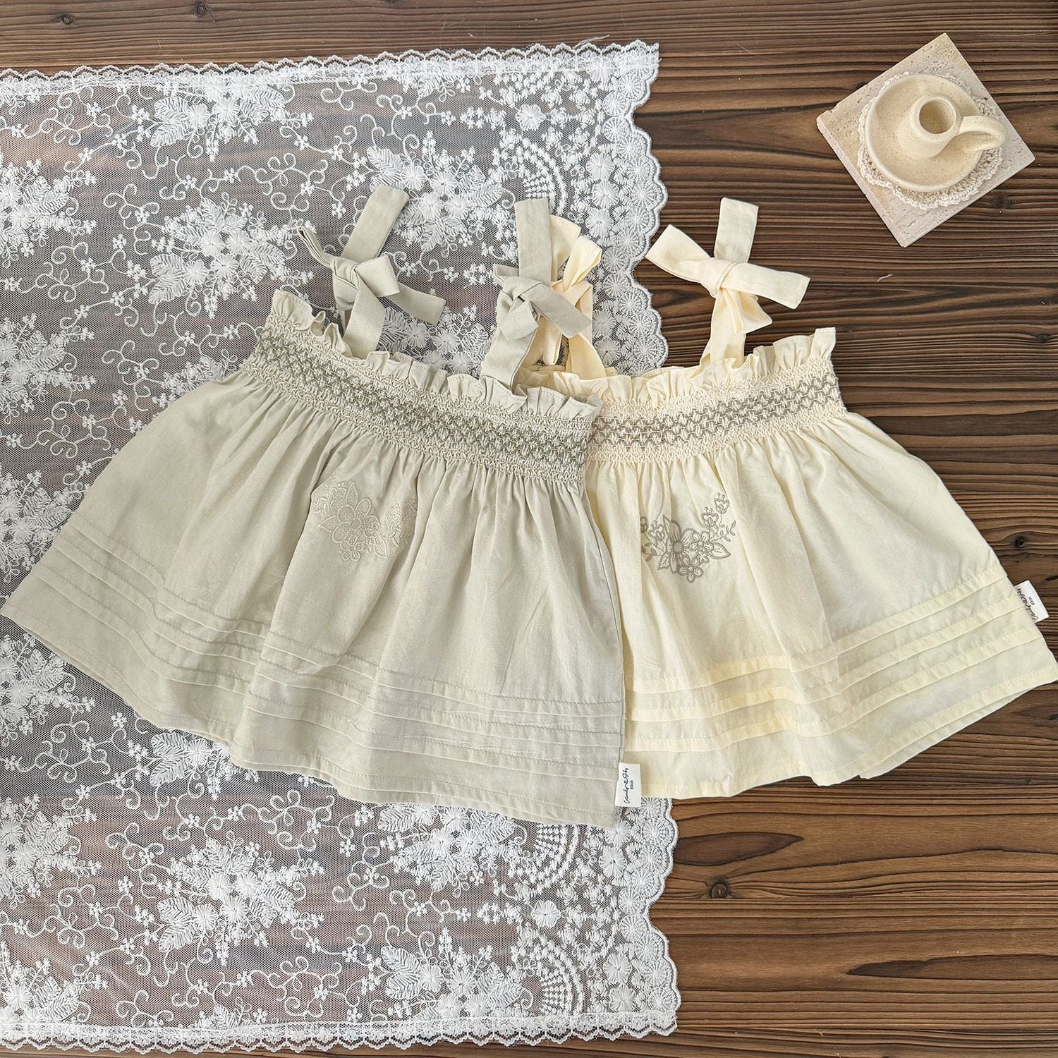 タンクトップ・キャミソール・ノースリーブトップス 刺繍ステッチリボンショルダーチュニックブラウス【mh0010429】