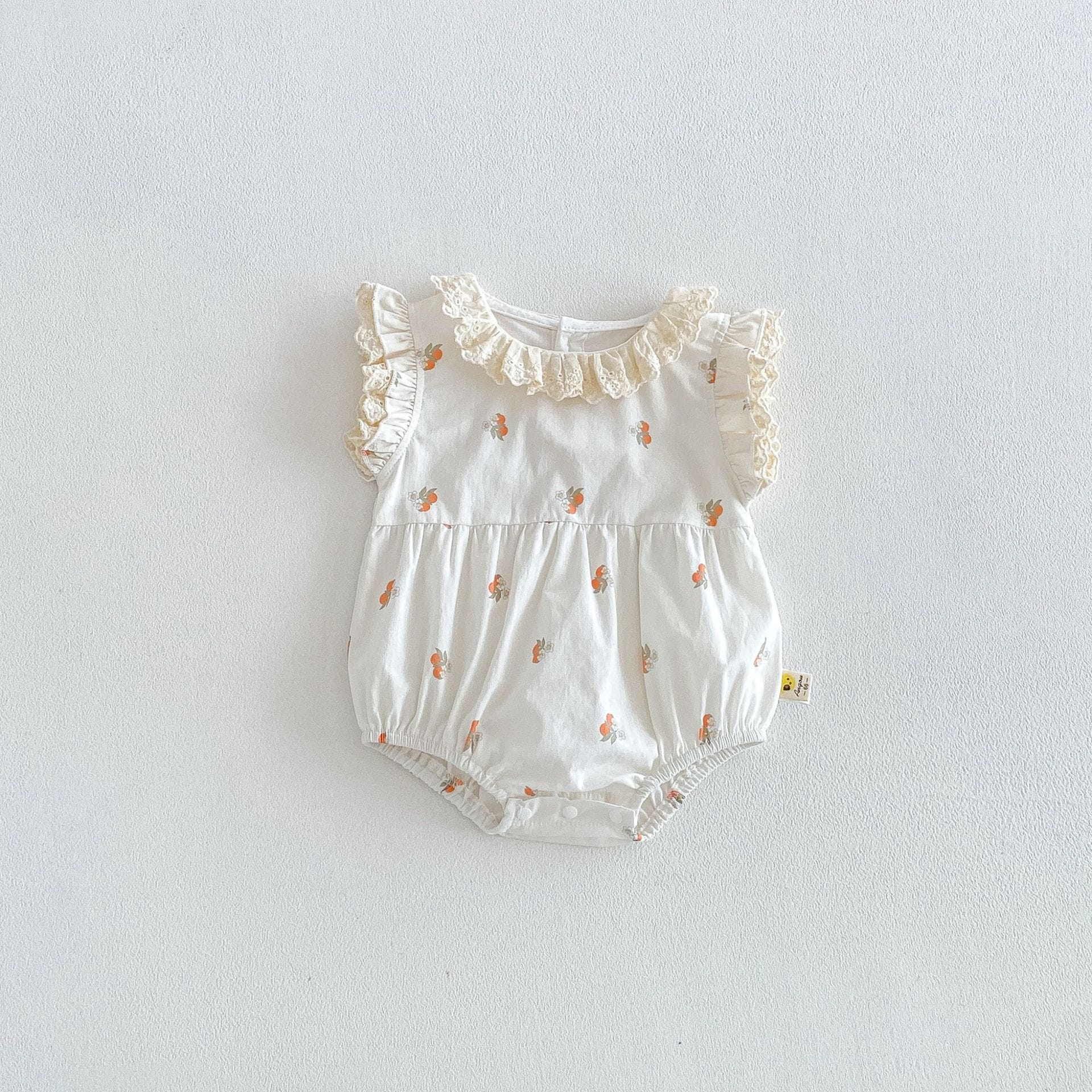 Floral Embroidered Ruffle Romper ラッフル レース袖ロンパース【mh0013425】 Apricot / 66cm angou ノースリーブロンパース