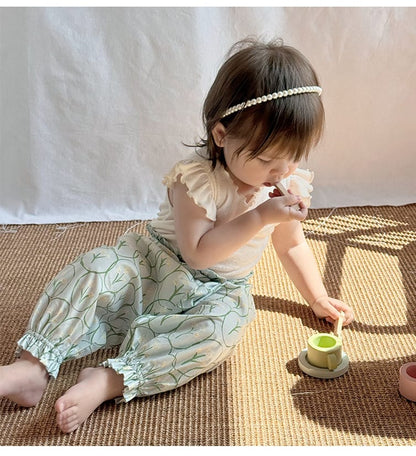 ミントグリーンのフラワープリントロングパンツ、裾とウエストはゴム