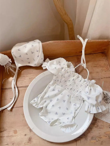 白地フローラル柄水着、後ろの結び紐とフリルスカート風