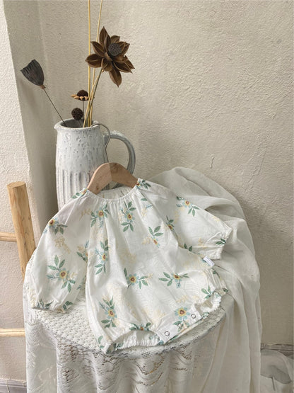 花柄刺繍入りベビー用ロンパース、丸首フリルの長袖