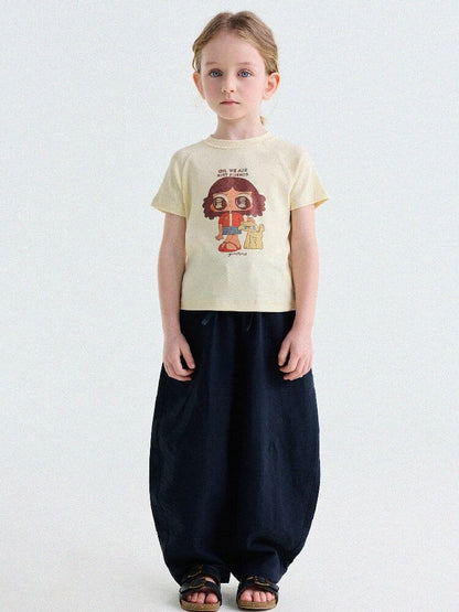 イエロー系のキャラクタープリント子どもラグランTシャツ（前）